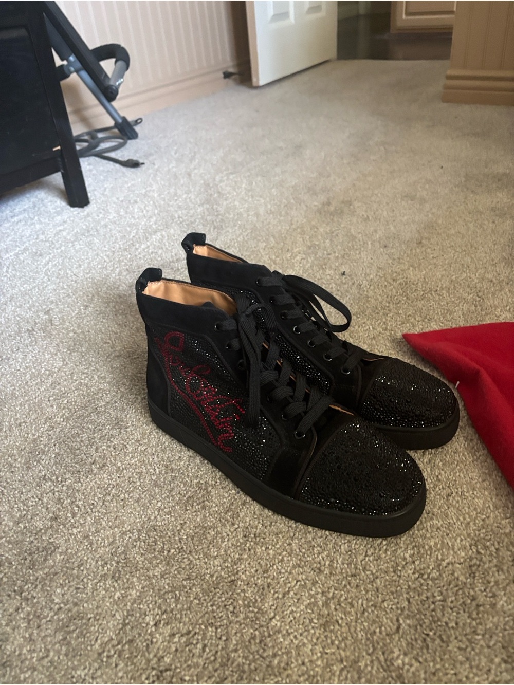 Christian Louboutin Black High-Top Sneakers with Red Script Accent
